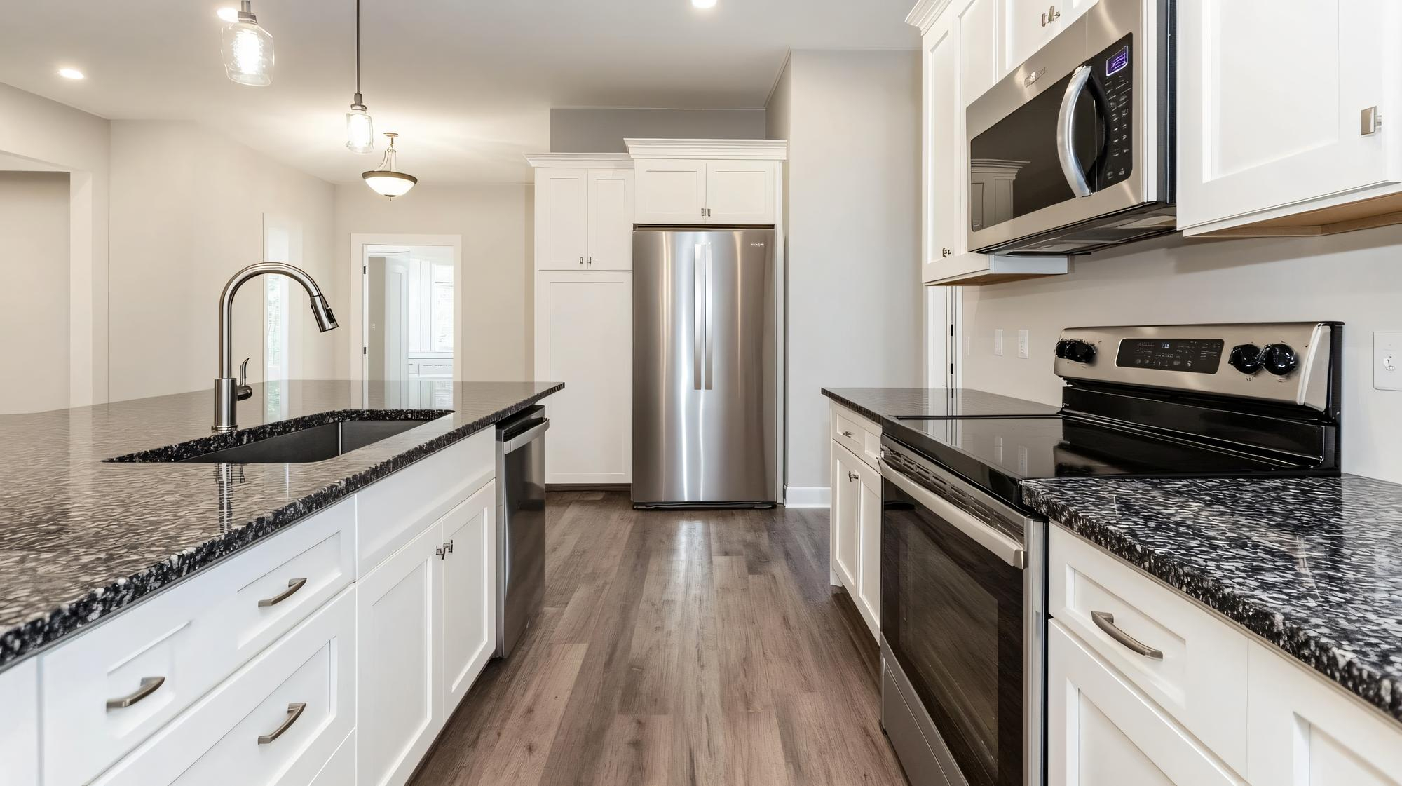 Natural granite slab selection Houston TX at Olafab Cabinetry showroom